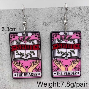 Pink and black acrylic tarot card drop earrings featuring The Reader design for Halloween