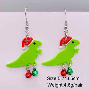 Détail de boucles d'oreilles dinosaure en acrylique avec bonnet de Noël, grelots et taille