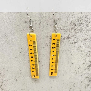 Creative yellow acrylic ruler drop earrings for teachers with black numerical scale details
