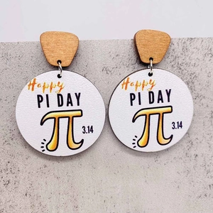 Wooden Pi Day earrings featuring 3.14 happy math theme pendants on stone texture