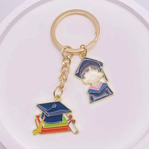2024 Graduation souvenir keychain with graduation cap, diploma, and student charms
