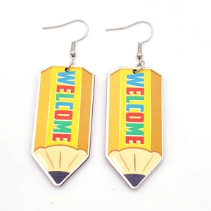 Pencil-shaped dangle earrings with Welcome text print and silver metal hooks for students