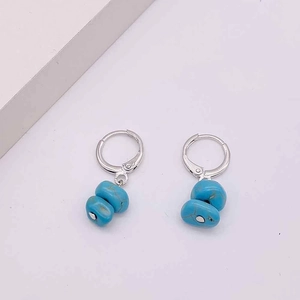Vintage silver hoop earrings with turquoise beads and natural texture pendants