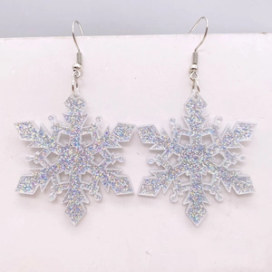 Sparkly acrylic snowflake drop earrings with colorful glitter and silver hooks for Christmas