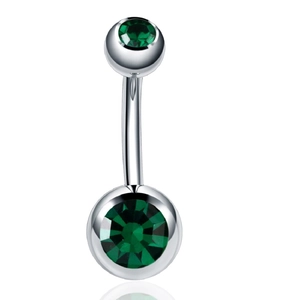 Detail of silver stainless steel navel ring featuring double green zircon stones