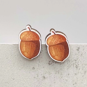 Artistic acorn wood earrings featuring brown printed textures for Thanksgiving festivals