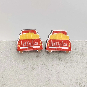 Fall wooden earrings featuring a red truck with pumpkins and Happy Fall text for Thanksgiving