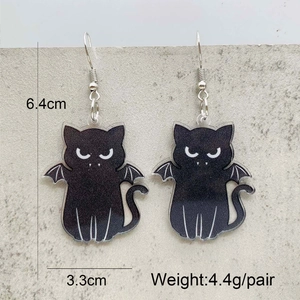 Detail shot of Halloween black cat bat earrings showing dimensions 6.4cm by 3.3cm