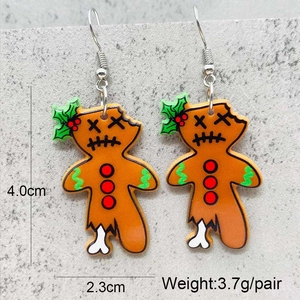 Detail showing acrylic gingerbread zombie earrings dimensions of 4.0cm x 2.3cm