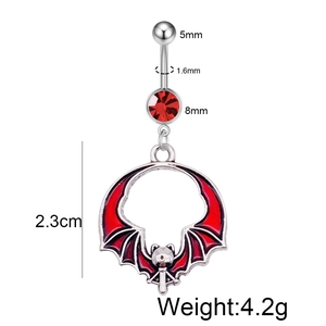 Gothic bat wing belly button ring with red gemstone and stainless steel piercing