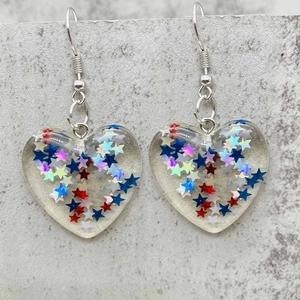 Acrylic heart earrings with colorful star sequins for USA Independence Day celebration
