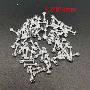 Macro view of transparent acrylic flat back ear studs 1.2mm labret piercing jewelry set