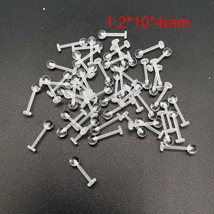 Macro detail of transparent acrylic flat back ear studs with 1.2x10x4mm sizing