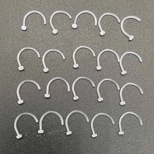 Set of 20 clear acrylic piercing retainers in C-shape for nose and ear cartilage piercings