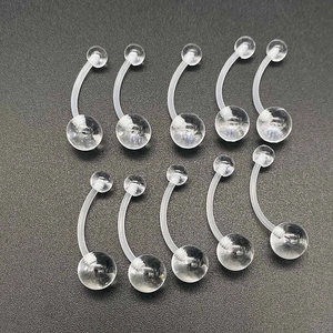 Detailed set of ten transparent flexible acrylic curved barbells for body piercing jewelry