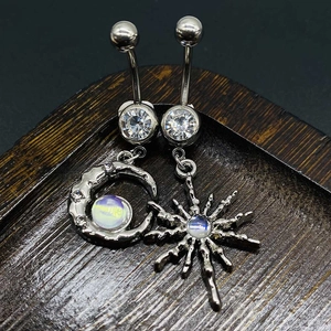 Polished stainless steel belly rings set featuring crescent moon and star opal pendants