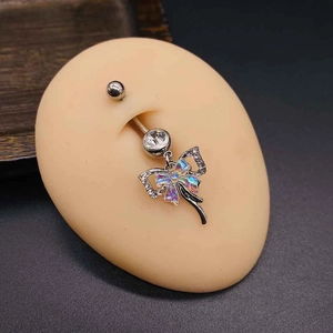 Polished stainless steel belly ring with bow pendant and colorful opal stone