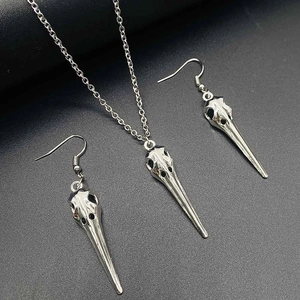 Gothic silver bird skull jewelry set with bird skull necklace and hook earrings