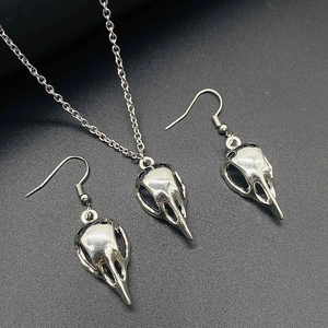 Western vintage crow skull jewelry set with necklace and earrings in antique silver finish