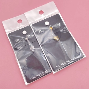 Piercings de ombligo en acero 316L con diseño de hoja brillante en oro y plata