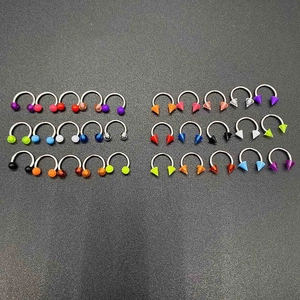 Variety set of acrylic and stainless steel circular barbells in vibrant candy colors