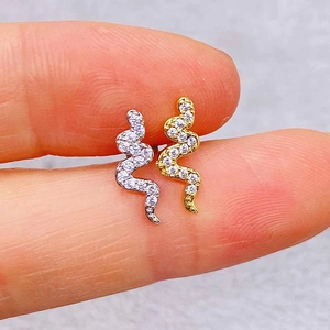 Elegant pair of gold and silver snake stud earrings with shimmering cubic zirconia stones