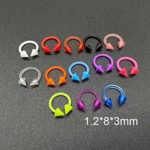Vue détaillée des barbells circulaires en acrylique coloré 1.2x8x3mm avec pointes