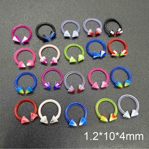 Lot de 20 anneaux fer à cheval en résine UV avec pointes cônes pour piercing nez et lèvre