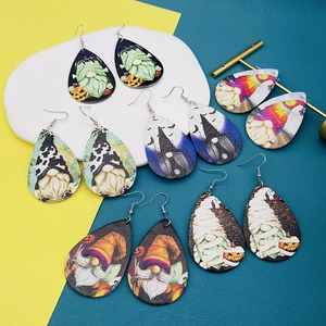 Set of 6 pairs of Halloween gnome teardrop leather earrings with festive holiday patterns