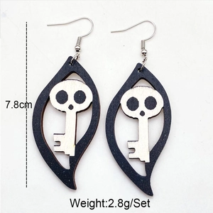 Halloween skull key earrings with black wood hollow leaves and silver hooks, 7.8cm height