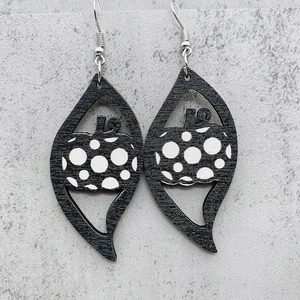 Halloween pumpkin earrings made of wood with black polka dot design for party