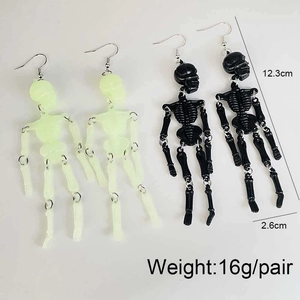 Luminous skeleton drop earrings in black and neon green for Halloween costumes