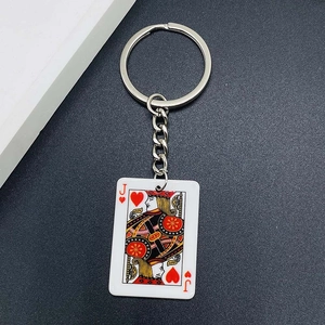 Close-up of Jack of Hearts acrylic poker card keychain with silver metal ring