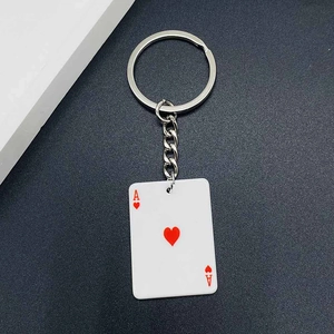 Close-up of Ace of Hearts acrylic poker card keychain with a silver metal chain