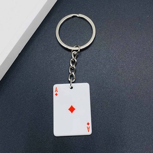 Detailed close-up of the Ace of Diamonds acrylic keychain with a silver metal ring