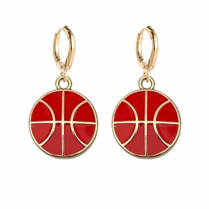 Detailed view of red basketball charm earrings with gold metal hoops for sports fans