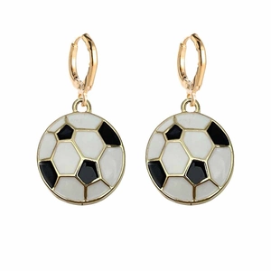 Detail of soccer ball charms with black and white enamel finish and gold-tone hooks