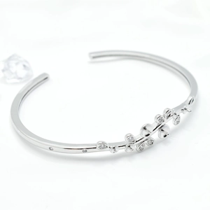 Polished silver 18k gold plated open flower bracelet with sparkling zircon stones