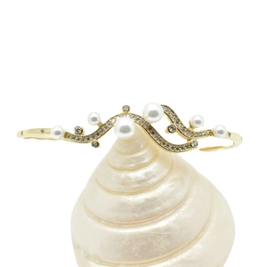 Elegant 18k gold plated wave bracelet with white pearls and micro-set zircon stones