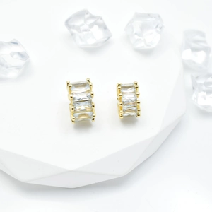 Gold plated round hoop earrings with rectangular baguette cubic zirconia stones