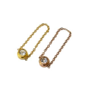 Elegante Halsketten mit Zirkonia-Anhänger in 18k Gold und Roségold auf weißem Hintergrund