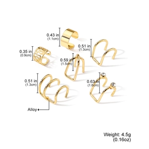 Set of 6 gold alloy geometric ear cuffs including wide, hollow, and rhinestone designs