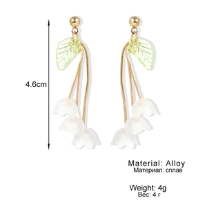 Elegant lily of the valley long tassel earrings with white flower petals and green leaf