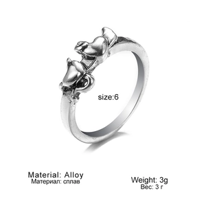 Detail view of vintage alloy ring with double heart design, size 6, weight 3g