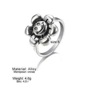 Retro vintage alloy punk ring with smiling face flower design in antique silver finish