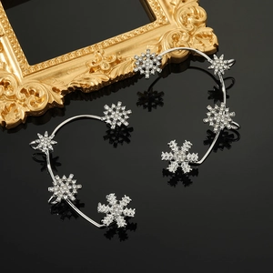 Sparkling silver snowflake ear cuffs with crystal rhinestones for a winter wedding