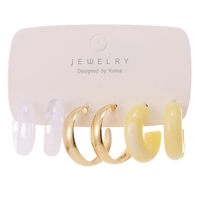 Set of 3 chunky C-shaped hoop earrings in clear resin, gold-tone metal, and marble acetate