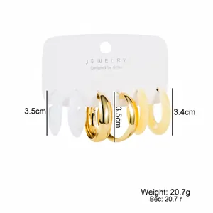 Three-pair set of C-shaped acetate and gold-tone resin hoop earrings with 3.5cm diameter