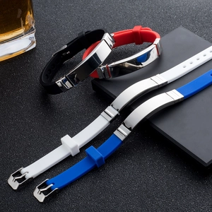 Detail view of silicone sport bracelets with polished steel plates and pin buckle