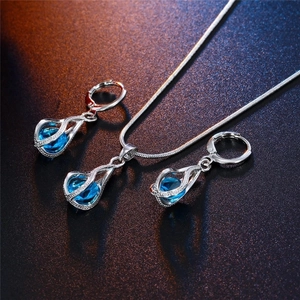 Parure de bijoux en argent avec pendentif en cristal bleu et boucles d'oreilles
